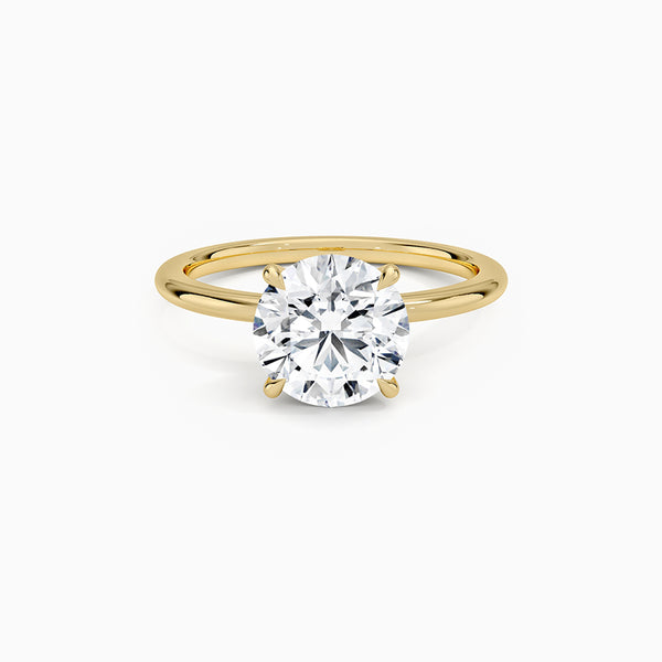 Carré de Luxe Collection D-E VS+ Round Diamond Prong Ring