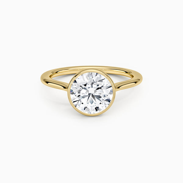 Carré de Luxe Collection D-E VS+ Round Diamond Bezel Ring